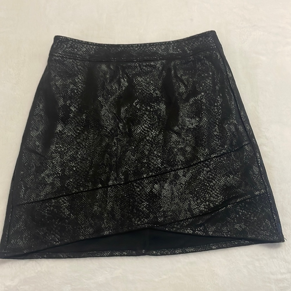 Snake print black soft leather skirt. Great for game-day outfits etc.